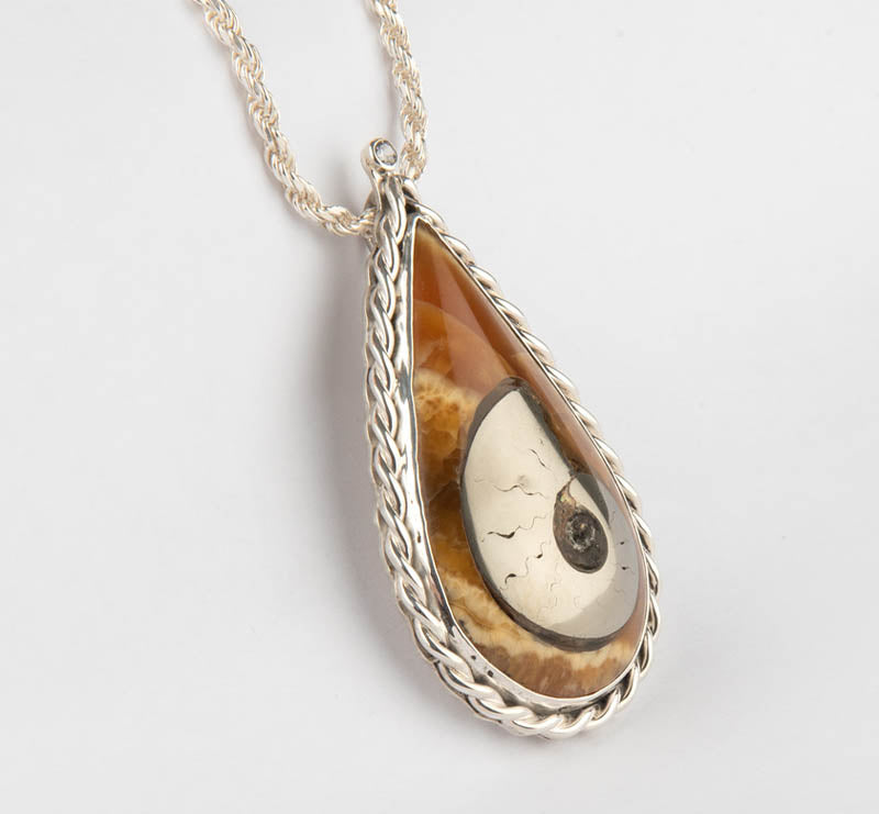 Pyritized Ammonite and Simbircite pendant set with .925 Sterling Silver w/ sterling silver chain